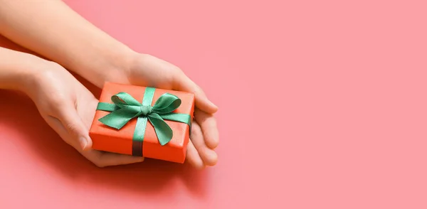 Female Hands Holding Christmas Gift Box Red Background Space Text — Stock Photo, Image