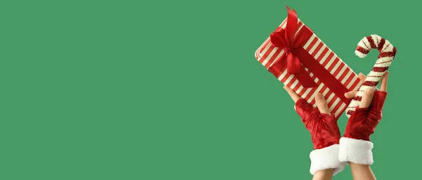 Female Hands Christmas Gift Box Candy Cane Green Background Space — Stock Photo, Image