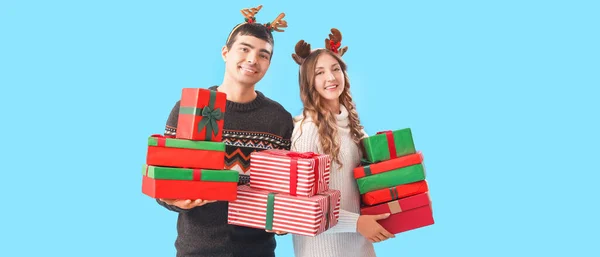 Young Couple Love Many Christmas Presents Light Blue Background — Stock Photo, Image