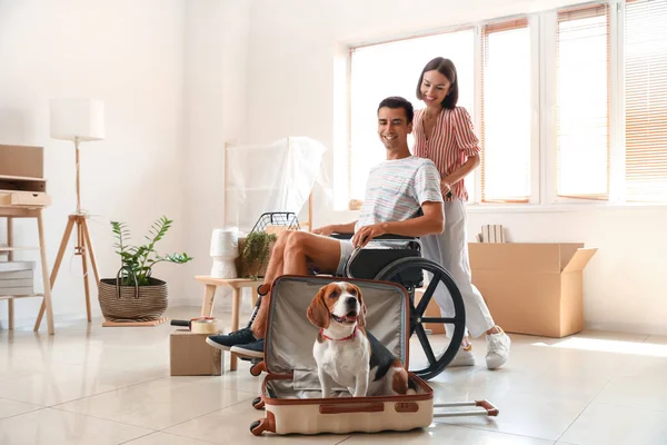 Young Woman Her Husband Wheelchair Dog Suitcase Moving Day — Stock Photo, Image