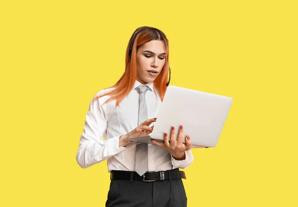 Beautiful Transgender Secretary Headset Laptop Yellow Background — Stock Photo, Image