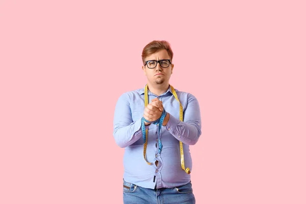 Upset Young Overweight Man Measuring Tapes Pink Background — Stock Photo, Image