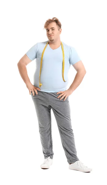 Junger Übergewichtiger Mann Mit Maßband Auf Weißem Hintergrund — Stockfoto