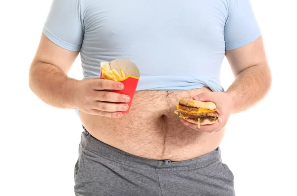 Pemuda Kelebihan Berat Badan Dengan Kentang Goreng Dan Burger Latar — Stok Foto