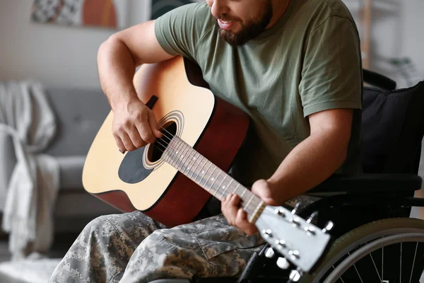 Young Soldier Wheelchair Playing Guitar Home Closeup — Stock Photo, Image