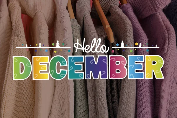 Banner with warm winter sweaters and text HELLO DECEMBER