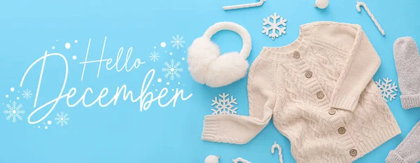 Banner with stylish winter sweater and text HELLO DECEMBER