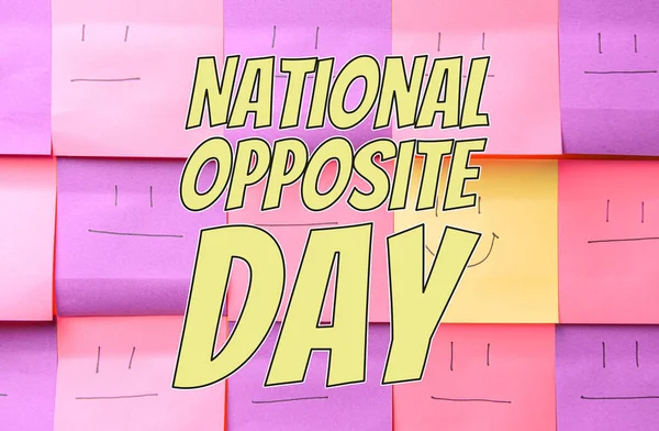 Paper sheet with drawn smiley emoticon among those with serious ones. National Opposite Day