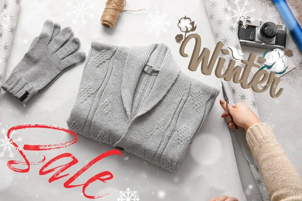 Banner for winter sale with stylish warm clothes