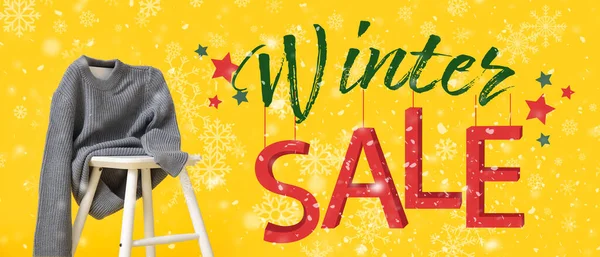 Banner for winter sale with chair and warm sweater on yellow background