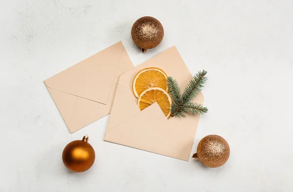Envelopes Christmas Branches Dried Citruses Balls White Background — Stock Photo, Image