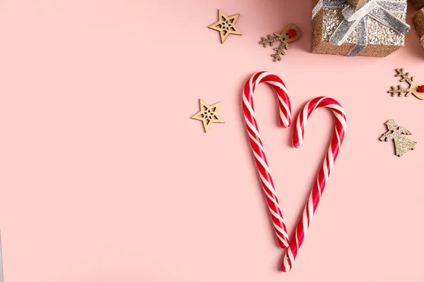 Heart Made Candy Canes Christmas Decorations Pink Background — Stock Photo, Image