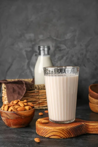 Wooden Board Glass Almond Milk Nuts Dark Background — Stock Photo, Image