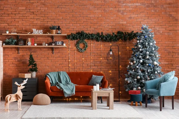 Interior of living room with sofa, Christmas trees and glowing lights