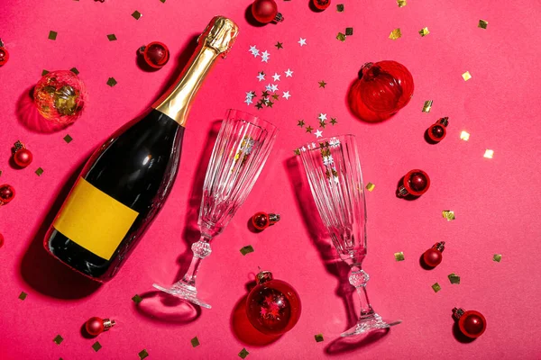 Bottle Champagne Glasses Christmas Balls Confetti Pink Background — Stock Photo, Image