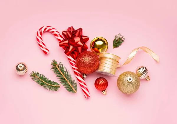 Christmas Balls Ribbon Candy Cane Fir Branches Pink Background — Stock Photo, Image
