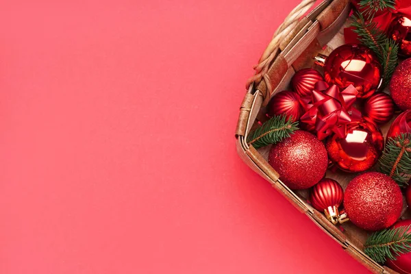 Basket Christmas Balls Fir Branches Red Background — Stock Photo, Image