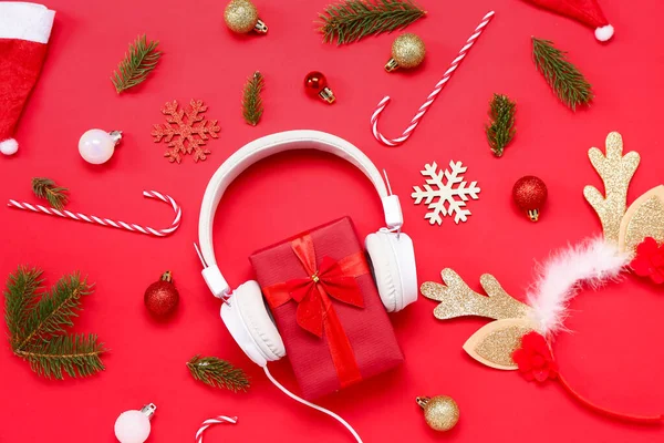 Headphones Gift Christmas Decor Reindeer Horns Red Background — Stock Photo, Image