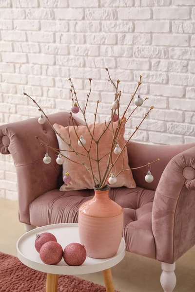 Vase Tree Branches Christmas Balls Table Armchair White Brick Wall — Stock Photo, Image
