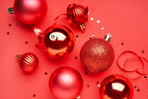 Christmas Balls Serpentine Stars Red Background — Stock Photo, Image