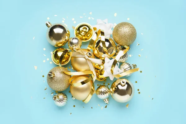 Golden Christmas Balls Serpentine Blue Background — Stock Photo, Image
