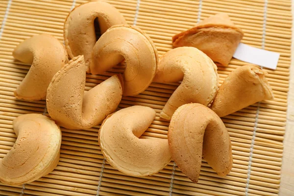Tasty Fortune Cookies Bamboo Mat Closeup — Stock Photo, Image