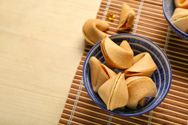 Bamboo Mat Bowl Fortune Cookies Wooden Background Closeup — Stock Photo, Image