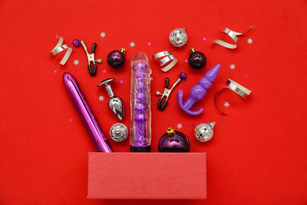 Подарочная Коробка Секс Игрушками Рождественским Декором Красном Фоне — стоковое фото