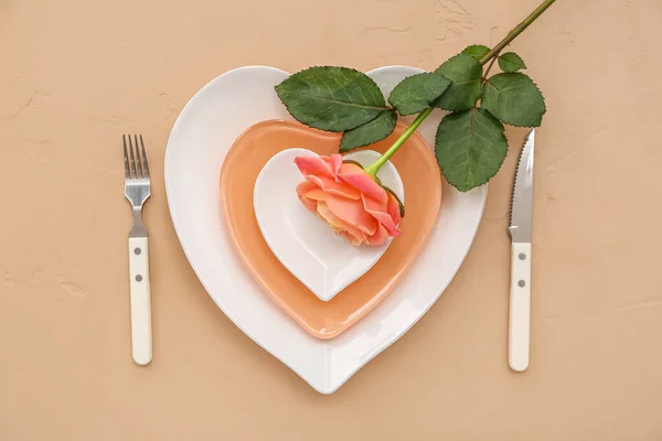 Table Setting Valentine Day Heart Shaped Plates Rose Beige Background — Stock Photo, Image