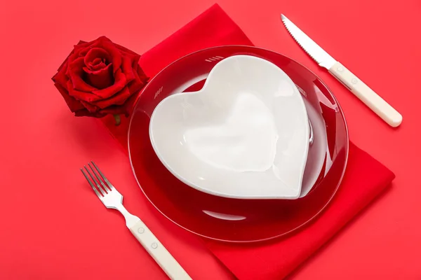 Table Setting Valentine Day Heart Shaped Plate Rose Red Background Stock Picture