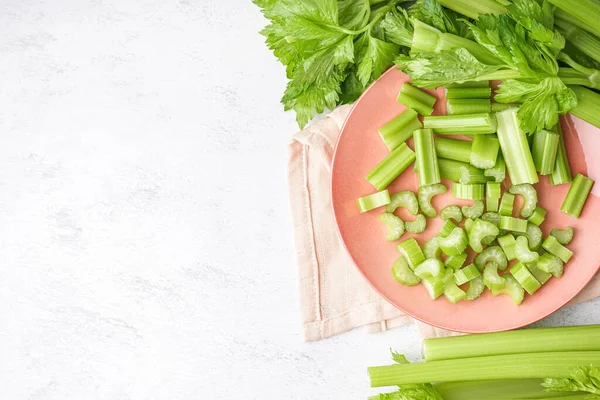 Plate Cut Fresh Celery Light Background — Stock Photo, Image