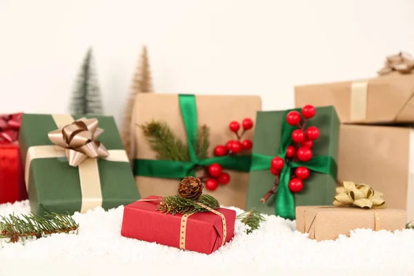 Christmas Gift Boxes Snow Light Background Closeup — Stock Photo, Image