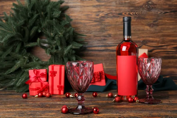 Bottle Wine Glasses Christmas Balls Dark Wooden Background — Stock Photo, Image