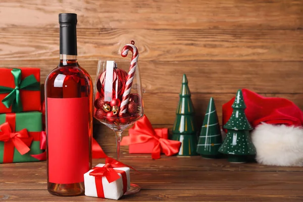 Bottle Wine Glass Christmas Toys Gift Wooden Table Closeup — Stock Photo, Image