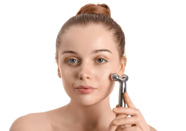 Pretty Young Woman Giving Herself Face Massage Metal Roller White — Stock Photo, Image