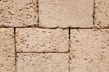 Arkaplan olarak taş tuğlalar, yakın plan