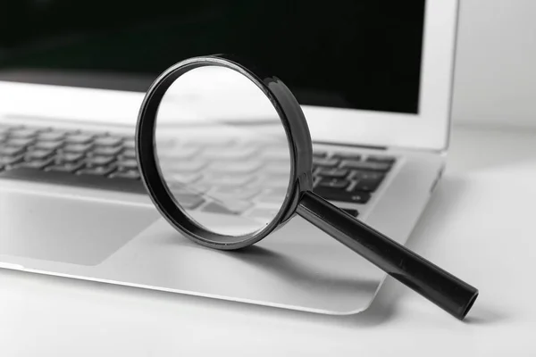 Magnifier Laptop White Table Closeup Internet Search Concept — Stock Photo, Image
