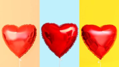 Renkli arka planda Sevgililer Günü kutlamaları için kalp şeklinde balonlar.