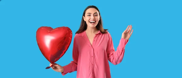 Young Woman Heart Shaped Balloon Blue Background — Stock Photo, Image