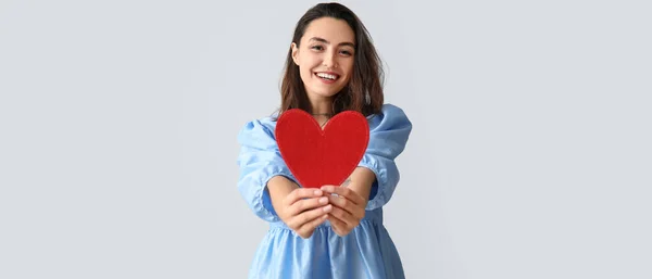 Young Woman Red Paper Heart Light Background — Stock Photo, Image