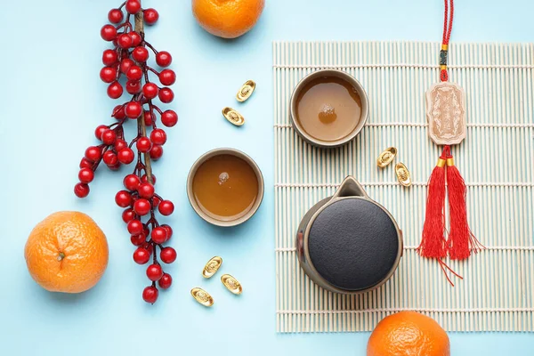 Bamboo Mat Teapot Cups Mandarins Chinese Symbols Blue Background New — Stock Photo, Image