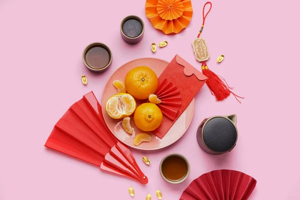 Plate Mandarins Envelope Cups Tea Chinese Symbols Pink Background New — Stock Photo, Image