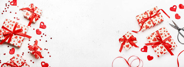 Gift boxes for Valentine's Day on light background with space for text