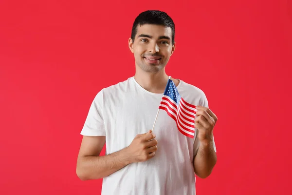 Young Man Usa Flag Red Background — Stock Photo, Image