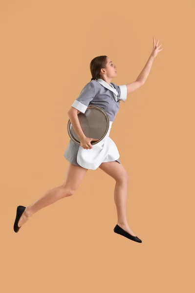 Young Waitress Tray Jumping Beige Background — Stock Photo, Image