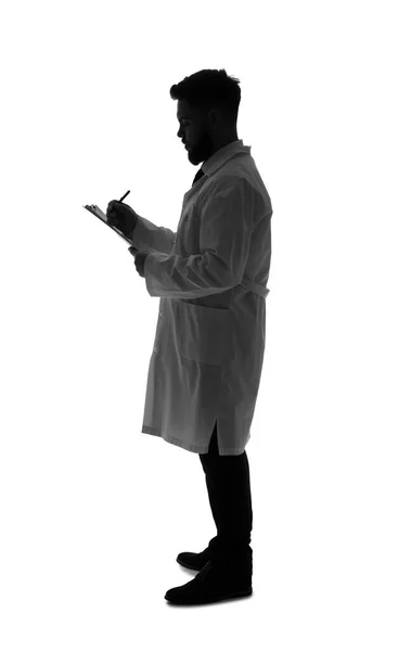 Silhouette Male Doctor Writing Clipboard White Background — Stock Photo, Image