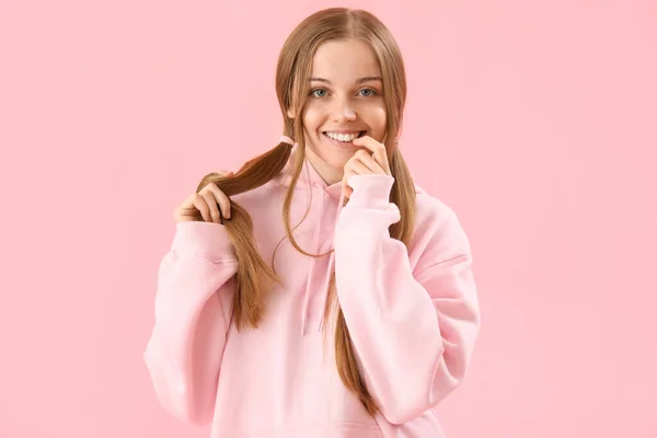 Young Woman Hoodie Biting Nails Pink Background — Stock Photo, Image