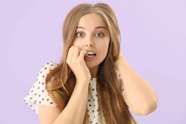 Young Woman Biting Nails Lilac Background Closeup — Stock Photo, Image