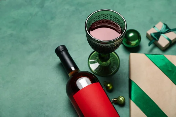 Bottle Glass Wine Christmas Balls Gifts Green Background Closeup — Stock Photo, Image