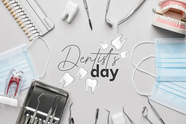 Card for Dentist\'s Day with different tools on light background